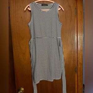 Black & white striped sleeveless fitted jersey dress with side ties.